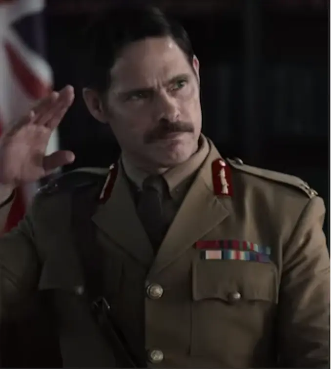 British actor Alex Reece portraying a commanding military officer in a period screen production