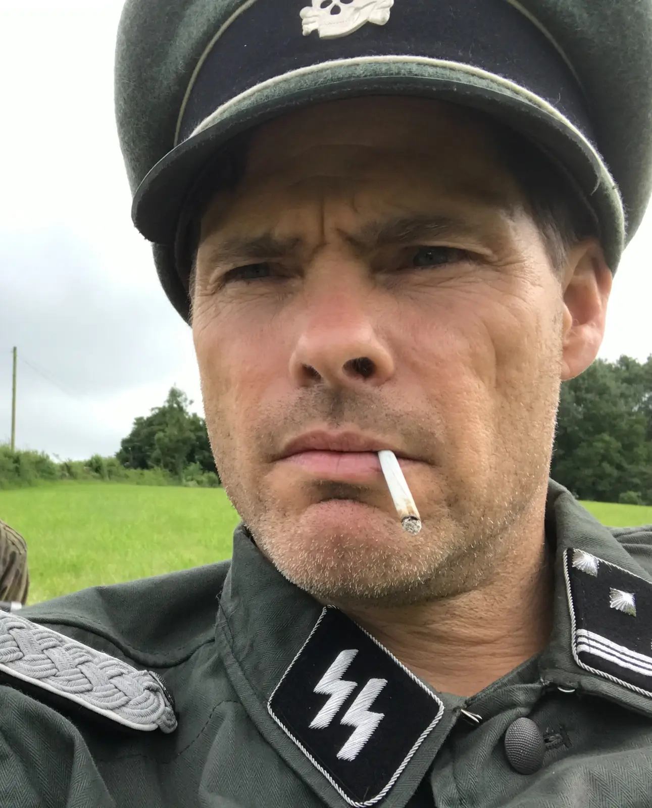 Alex Reece as The Captain in The Aryan Papers